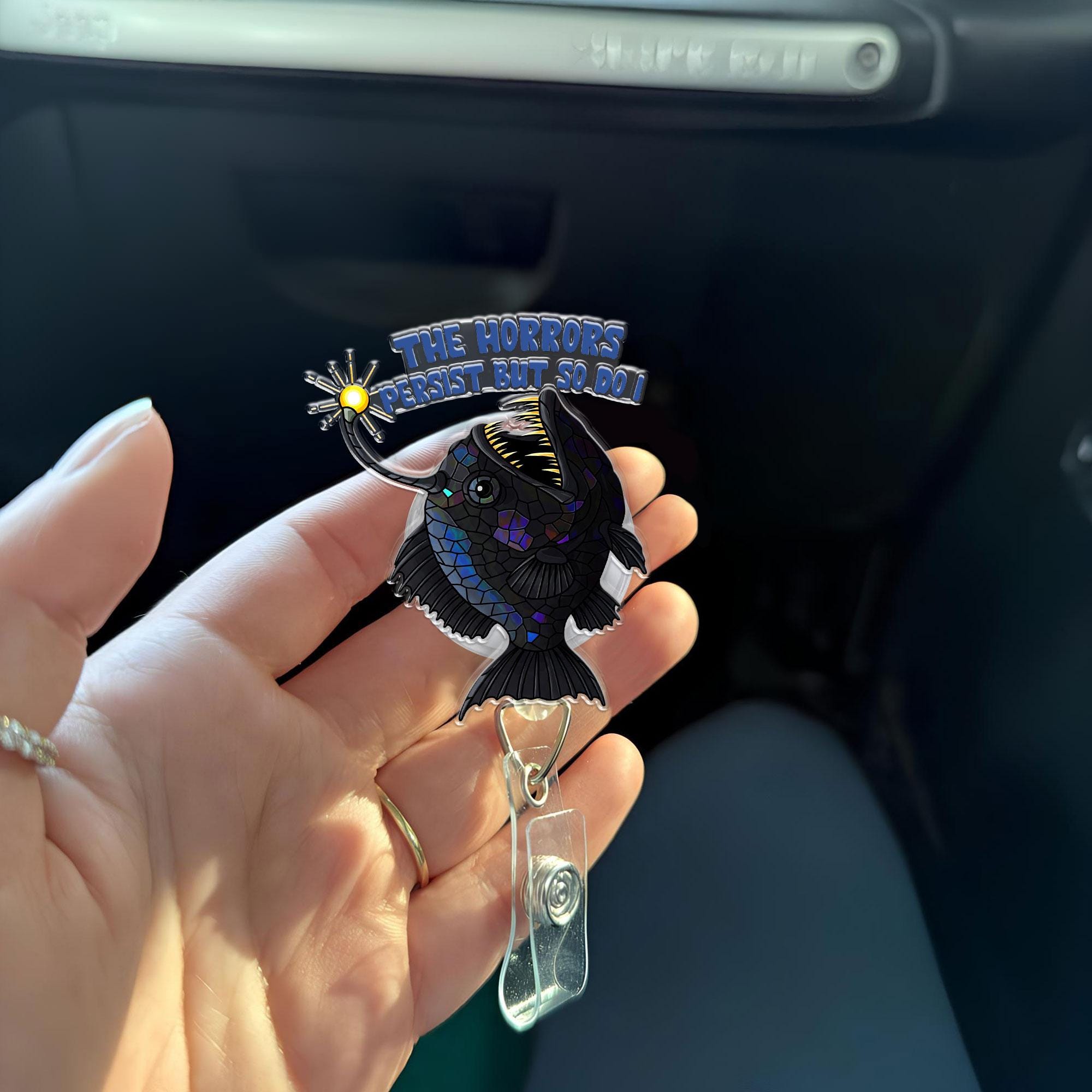 Anglerfish Horrors Persist But So Do I Badge Reel, Black Sead evil Fishing Gen z inspired, She Rises, deep sea fish badge reel