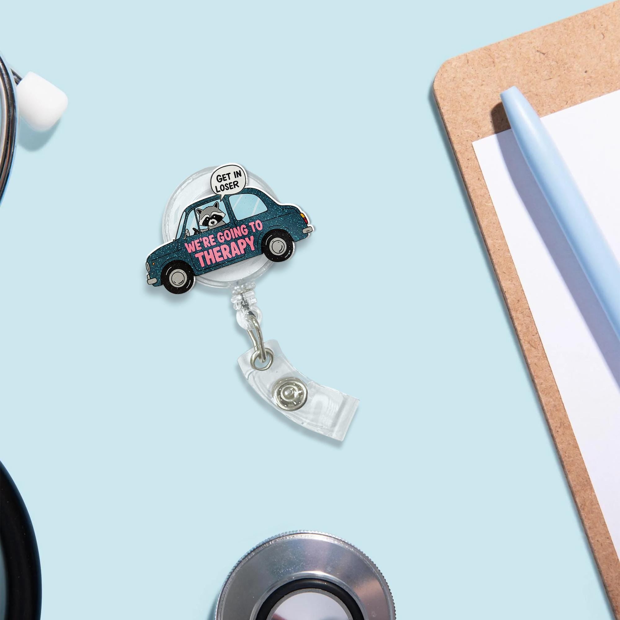 Get in loser we're going to therapy badge reel, funny raccoon ID holder for therapists, quirky mental health accessories gift