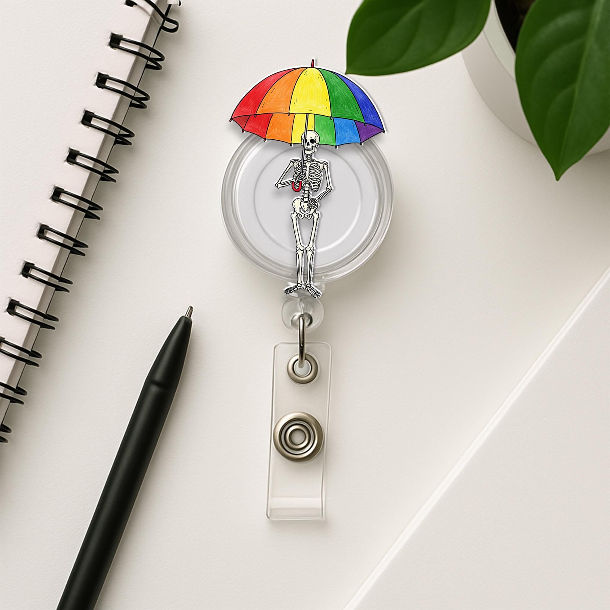 Skeleton Holding LGBT Umbrella Badge Reel, Pride ID Holder, Queer Skeleton Badge Clip, LGBTQ+ Accessory, Fun Nurse Badge Reel
