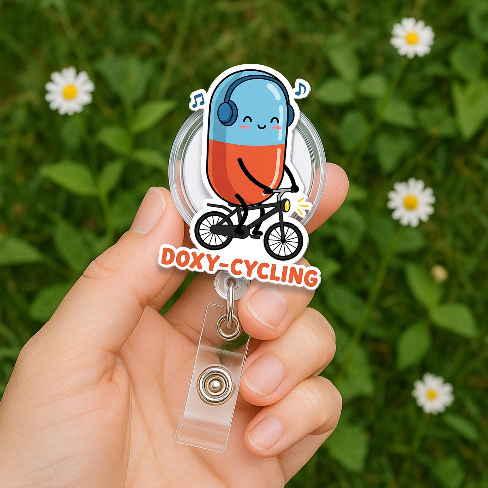 Doxy-Cycling Badge Reel, Funny Pill on Bike ID Clip, Pharmacist Nurse Gift, Cute Medical Pun Badge, Cycling Medicine Reel