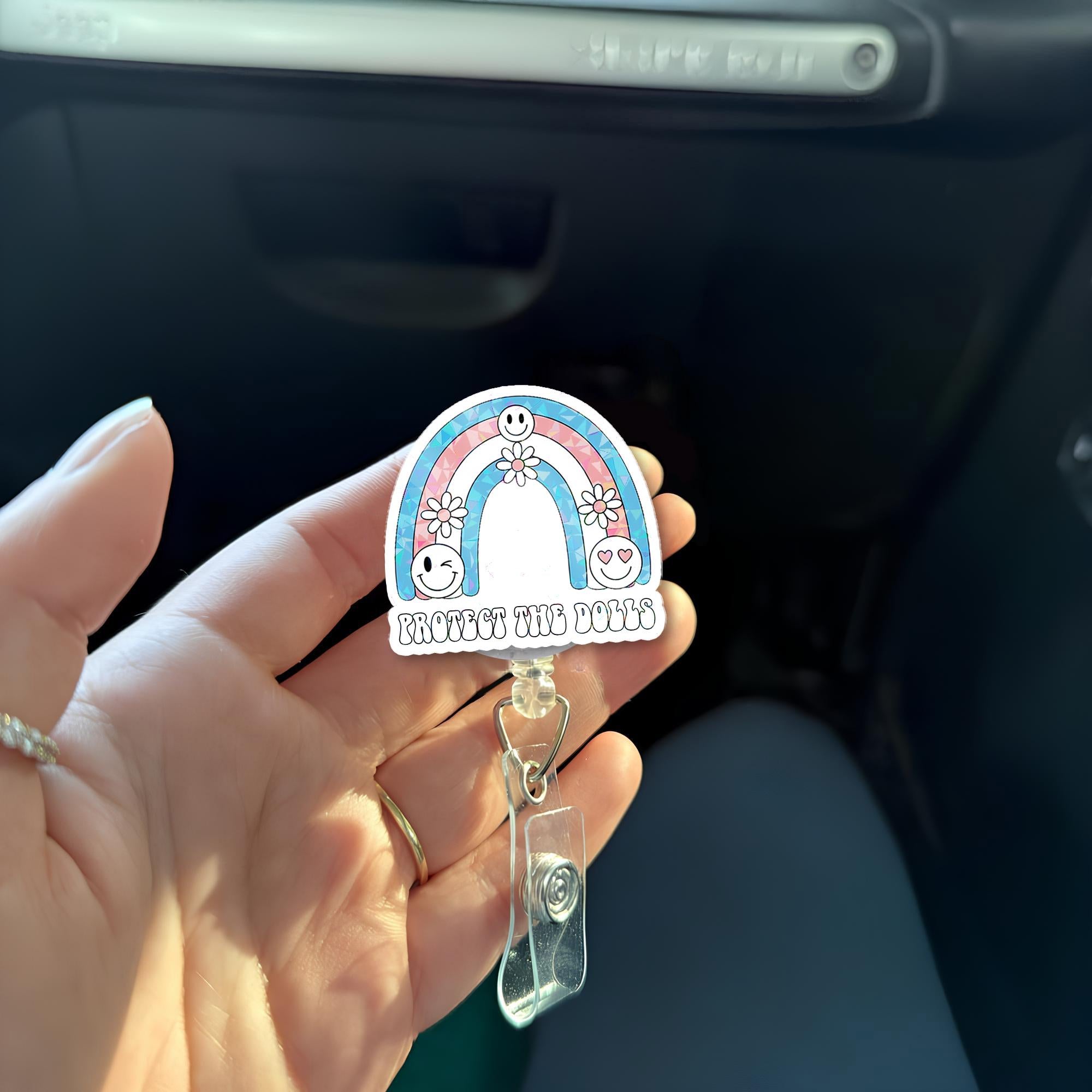 Protect the Dolls Badge Reel – Trans Flag Rainbow ID Clip – Cute Pride Work Badge – Inclusive LGBTQ Retractable Holder