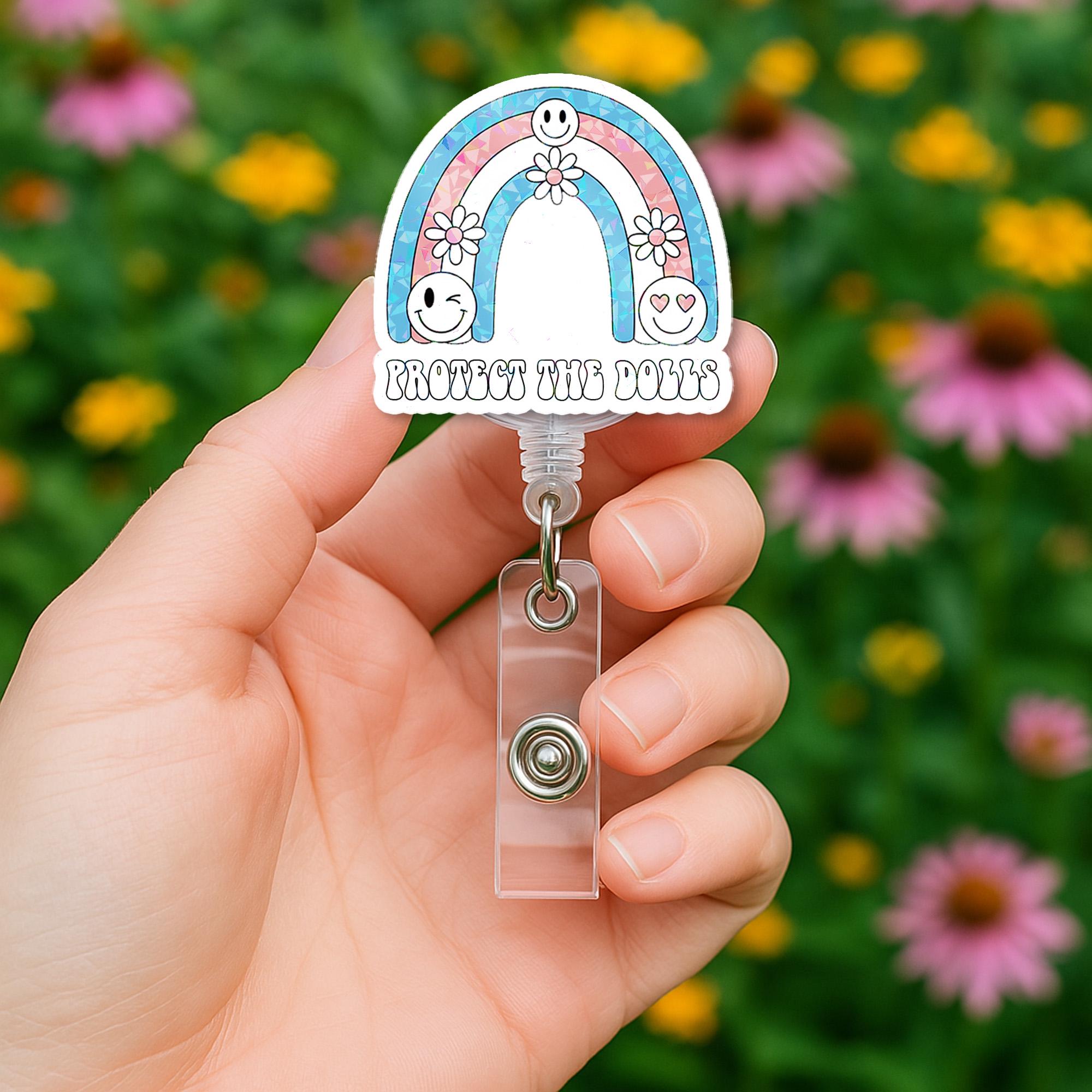 Protect the Dolls Badge Reel – Trans Flag Rainbow ID Clip – Cute Pride Work Badge – Inclusive LGBTQ Retractable Holder