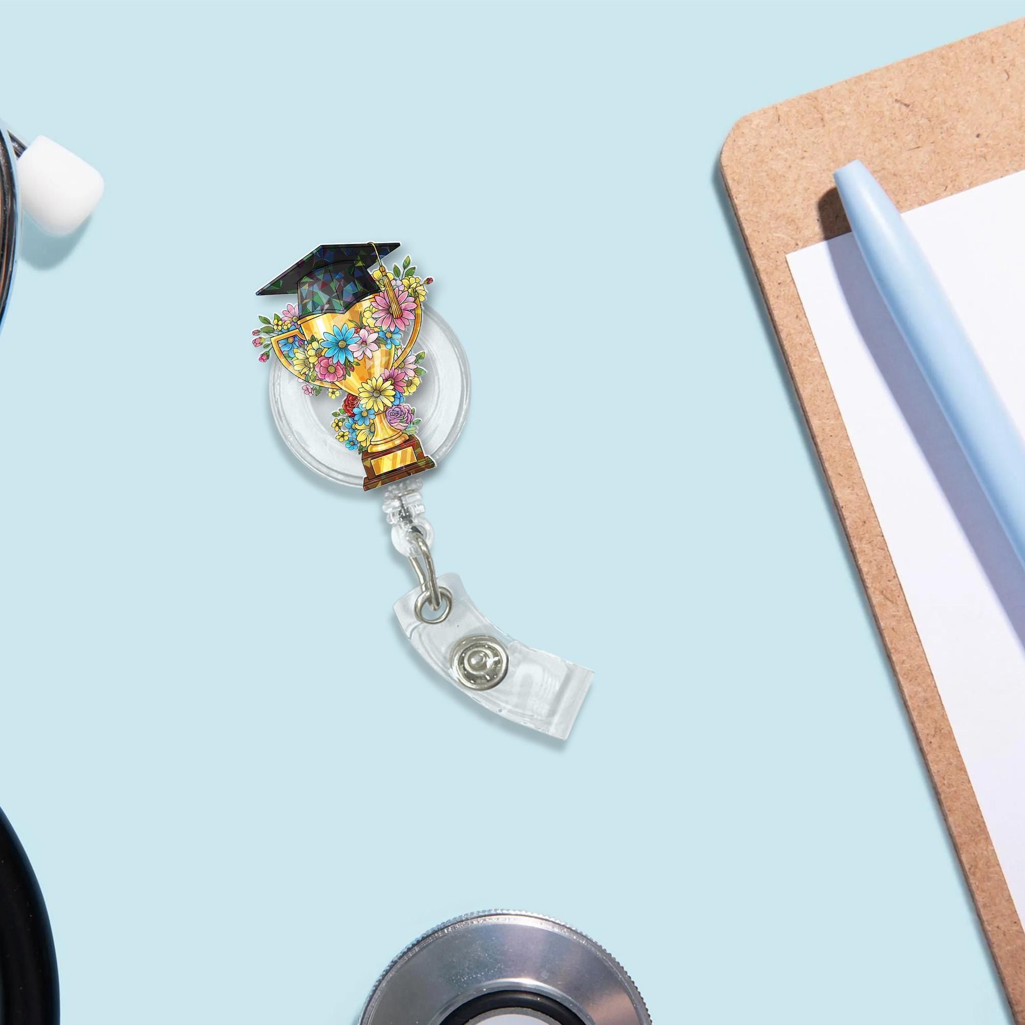 Graduation Trophy Badge Reel – Teacher or Grad ID Holder – Floral Cap Clip – End of Year Gift – Academic Award Lanyard