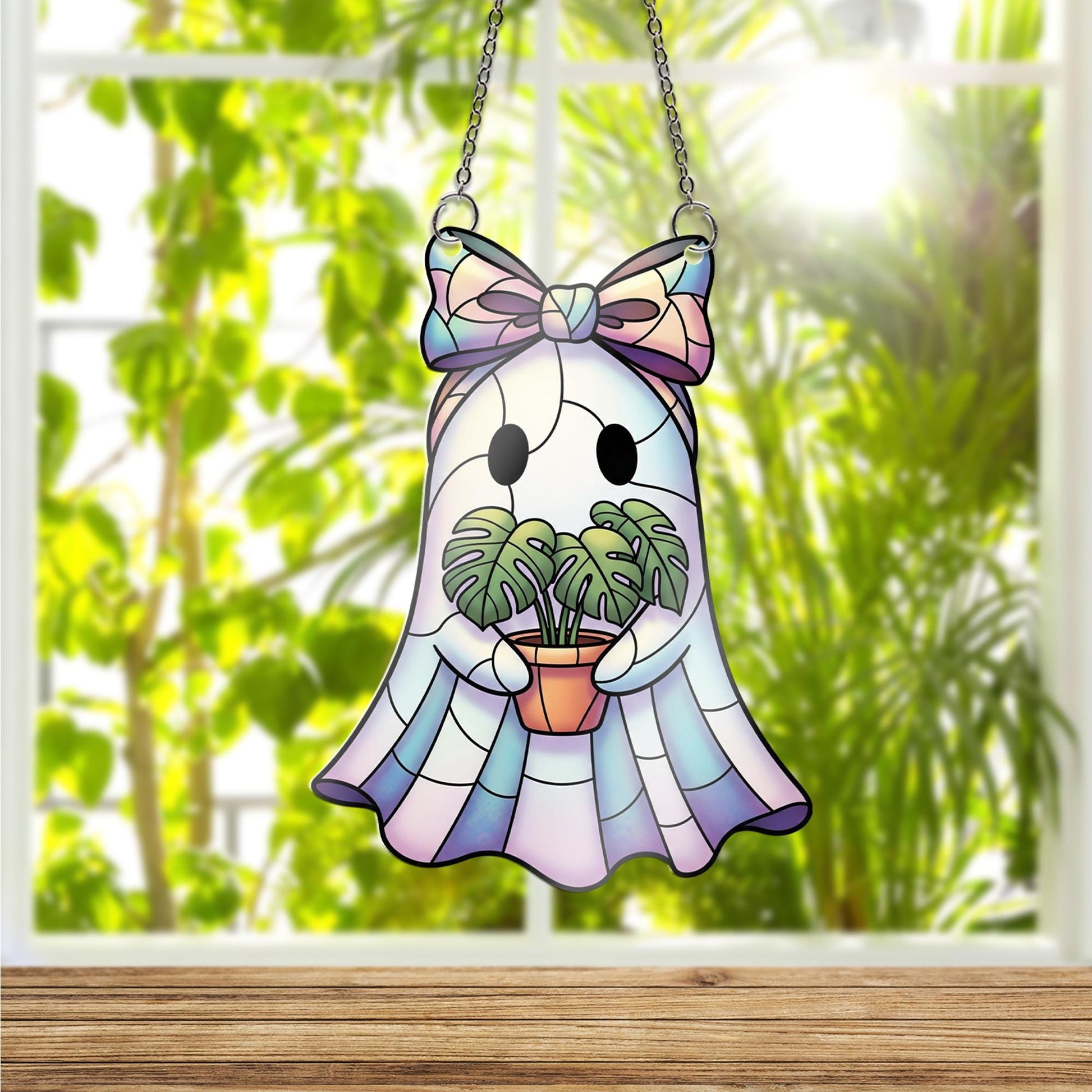 Iridescent Ghost Window Hanging – Faux Stained Glass Plant Lover Decor, Kawaii Spooky Suncatcher with Monstera and Pastel Bow