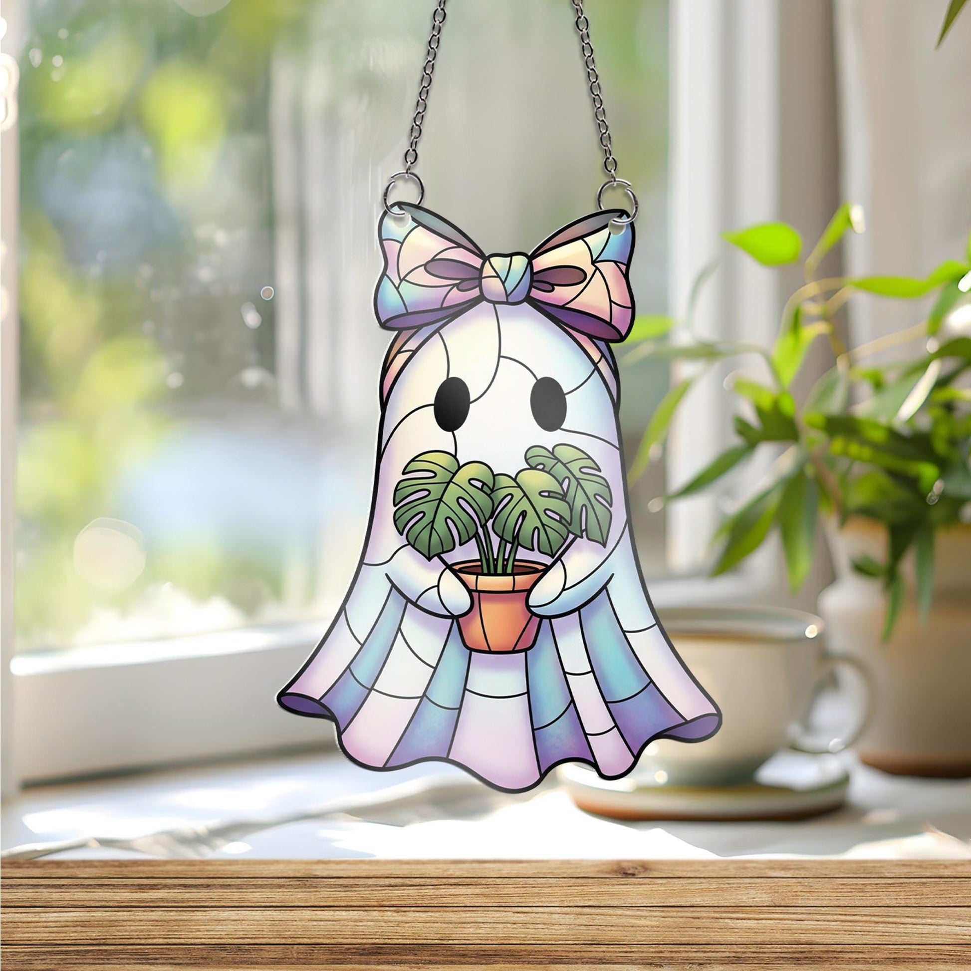 Iridescent Ghost Window Hanging – Faux Stained Glass Plant Lover Decor, Kawaii Spooky Suncatcher with Monstera and Pastel Bow