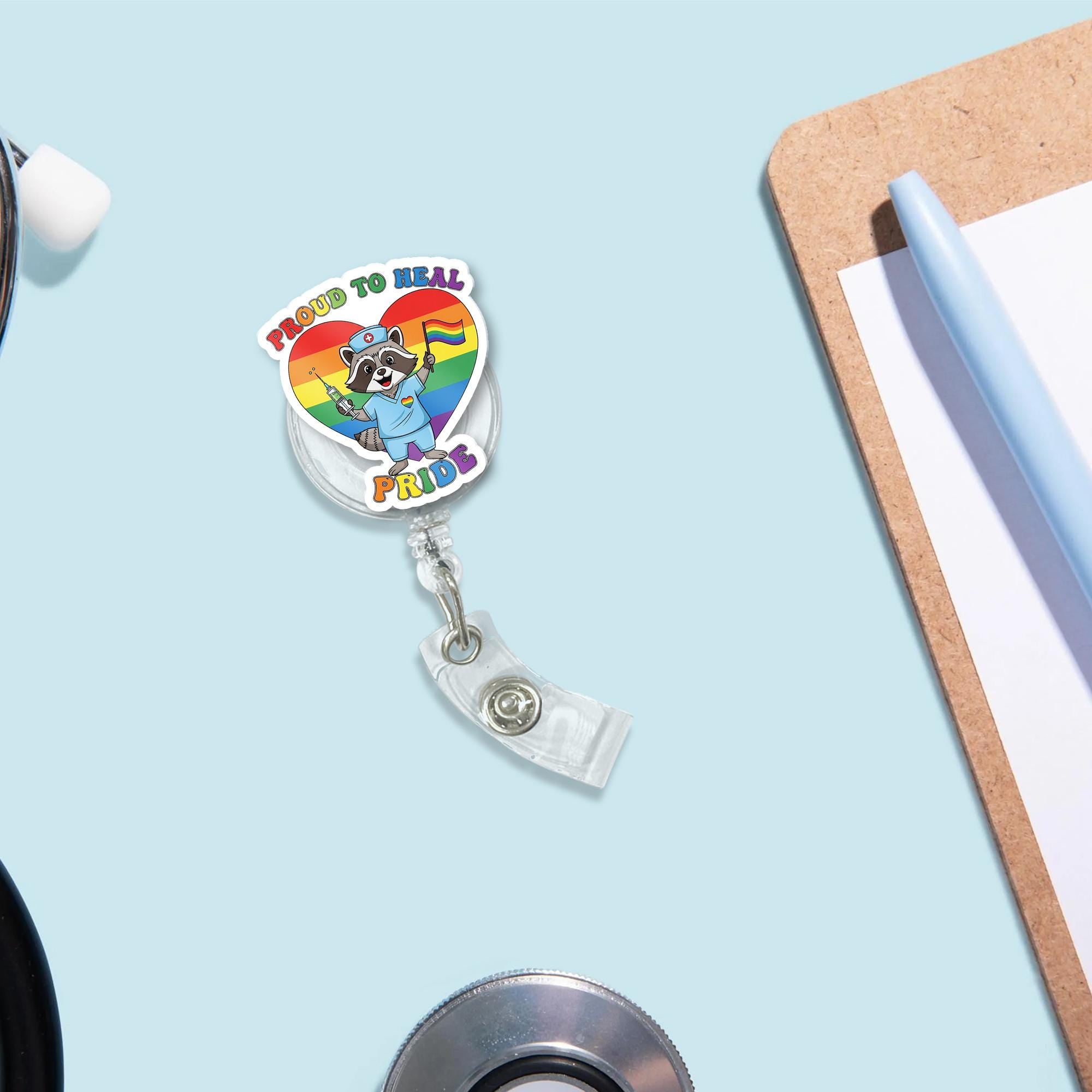 Proud To Heal Raccoon Nurse LGBTQ Pride Badge Reel, Cute Retractable ID Holder, Rainbow Medical Gift, Healthcare Worker Ally Accessory