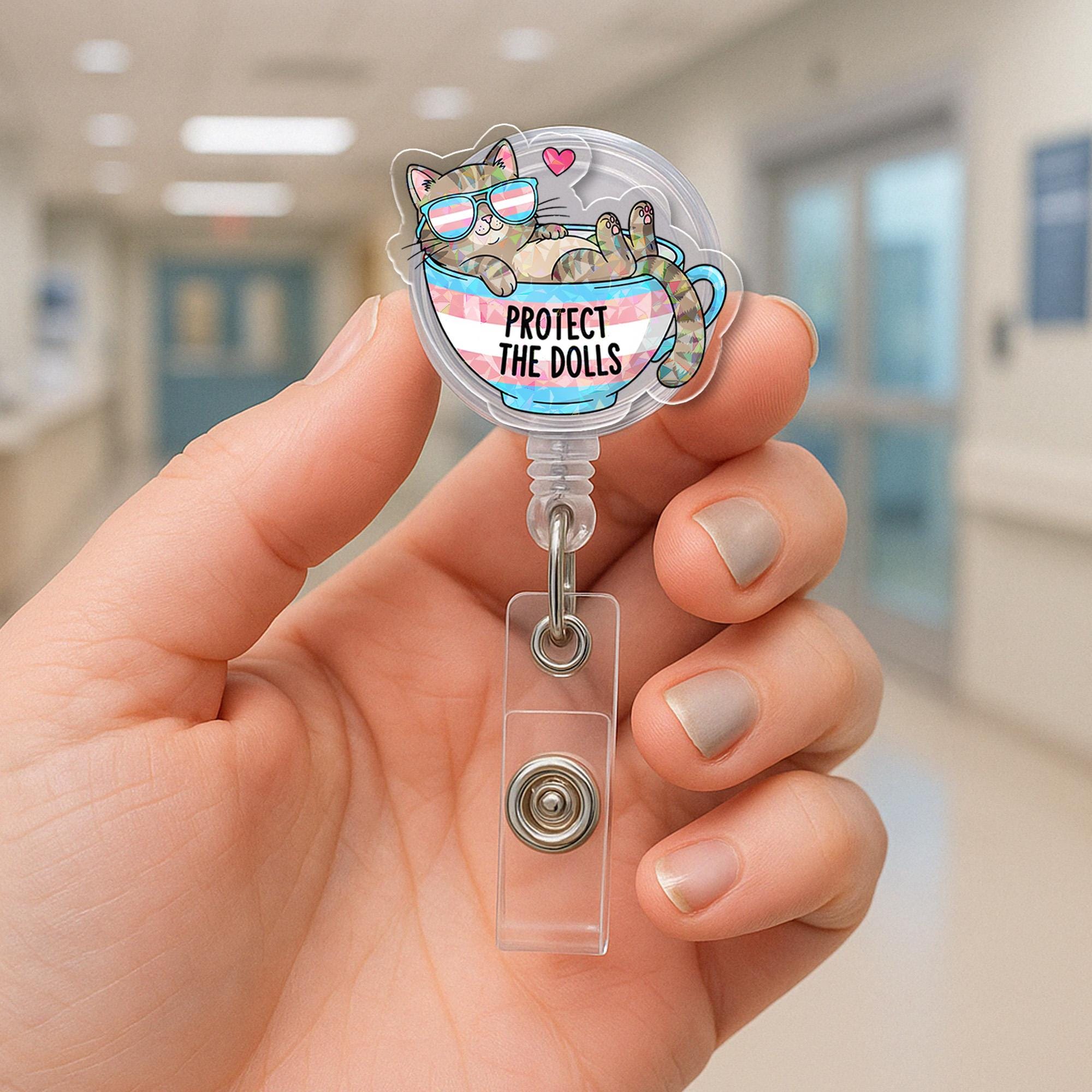 Protect the Dolls Badge Reel | Trans Pride Cat ID Holder | LGBTQ+ Nurse Gift | Funny Pride Month Clip | Cute Teacup Badge Reel