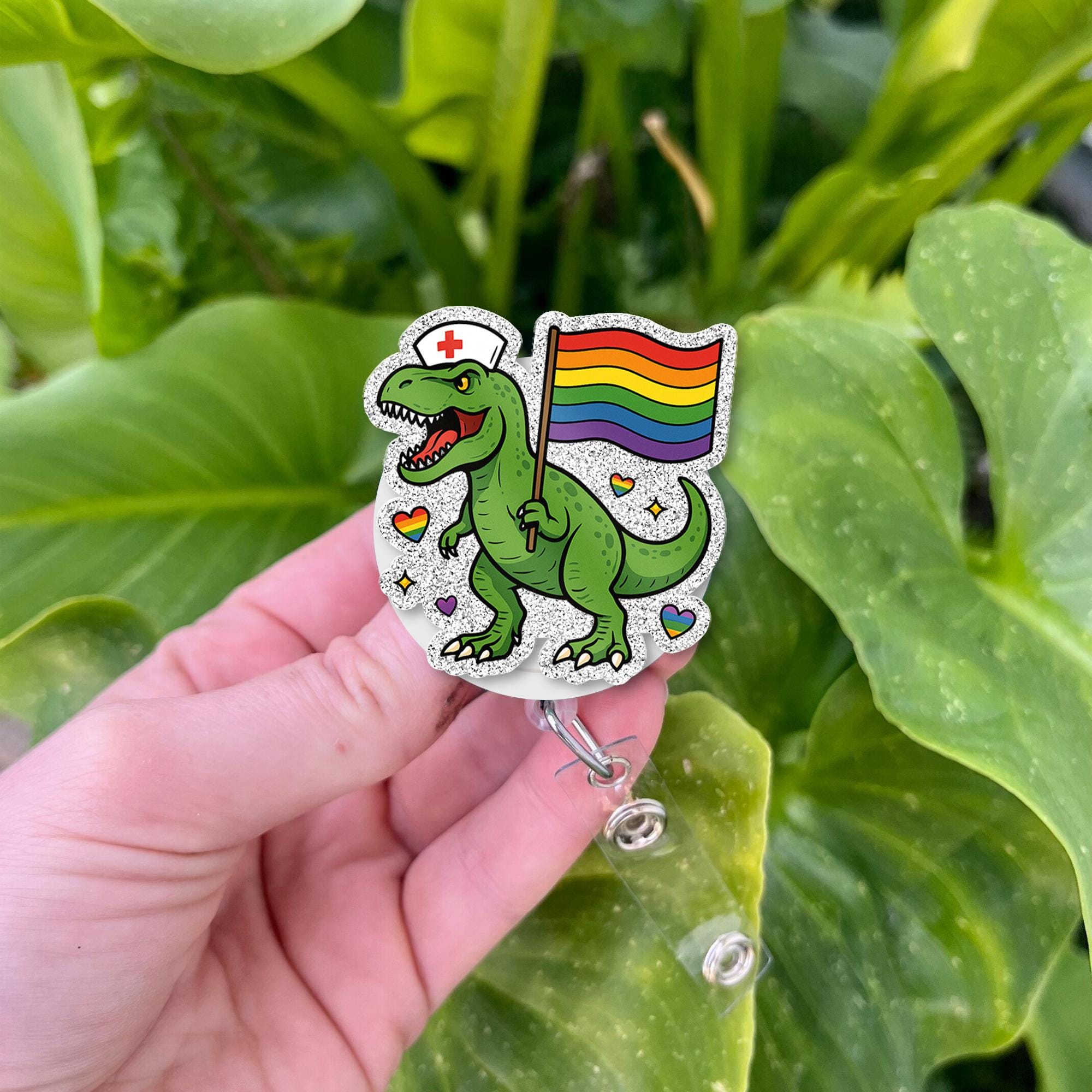 Dino Nurse Pride Badge Reel | LGBTQ+ Rainbow ID Holder | Funny T-Rex Nurse Clip | Pride Month Gift | Cute Dinosaur Badge for Nurses