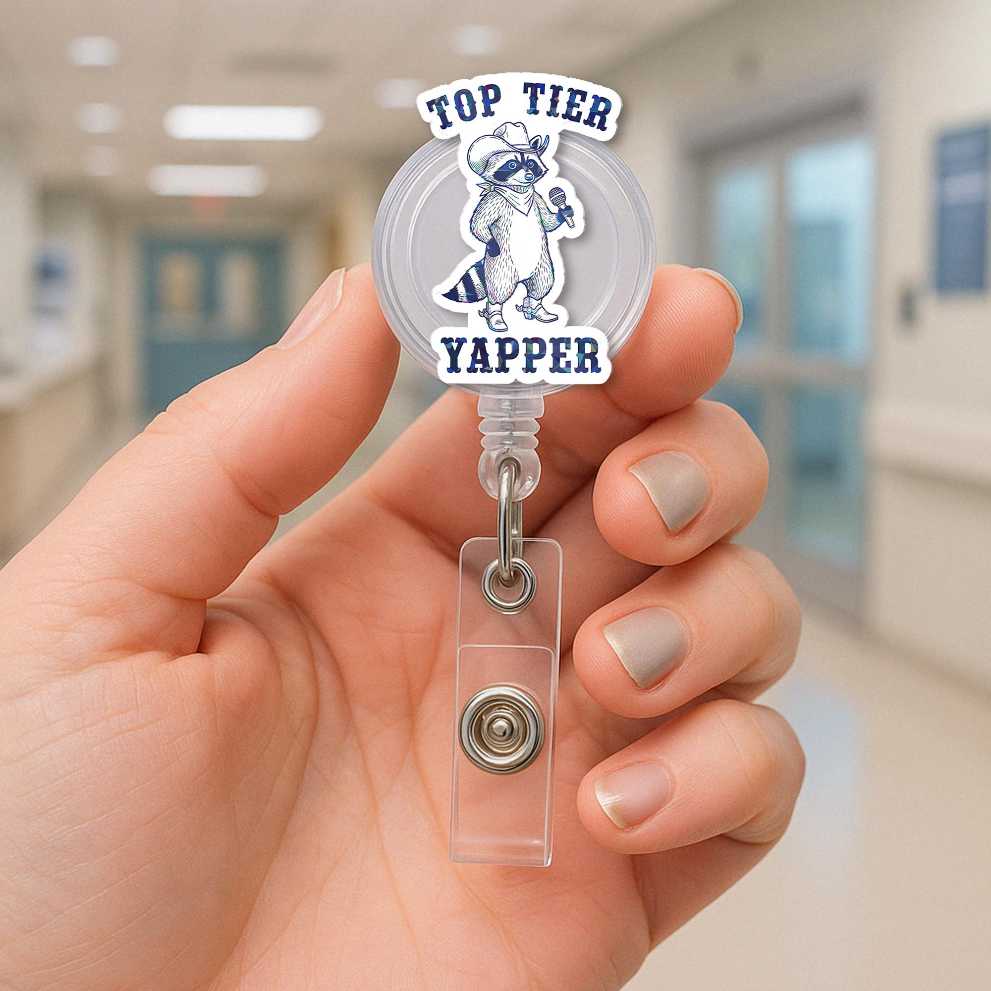 Top Tier Yapper Badge Reel – Funny Raccoon Retractable ID Holder, Humorous Work Accessory for Nurses, Office, or Customer Service