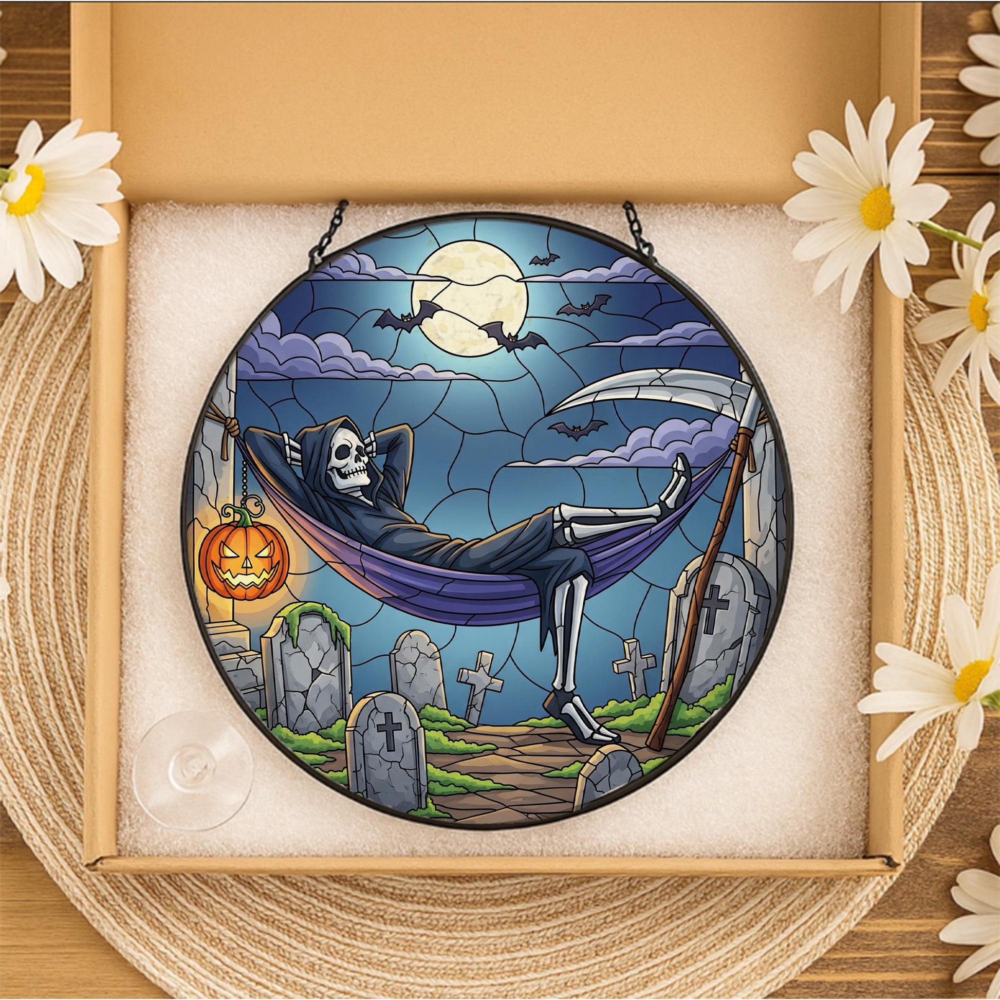 Stained Glass Halloween Suncatcher – Grim Reaper Skeleton in Hammock – Spooky Gothic Window Decor – Creepy Graveyard Art Gift