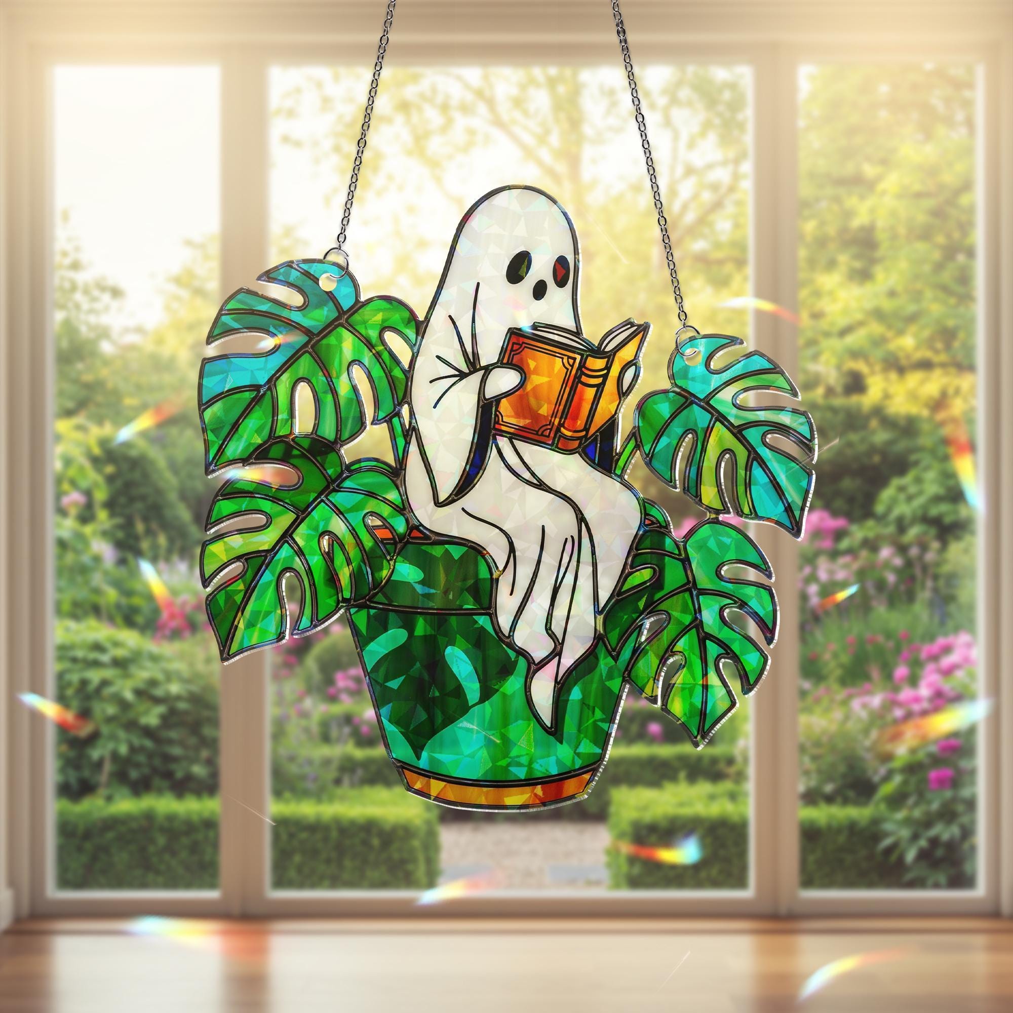 Ghost Plant Suncatcher – Holographic Acrylic Window Decor, Reading Ghost in Monstera Pot, Spooky Cottagecore Gift for Plant Lovers