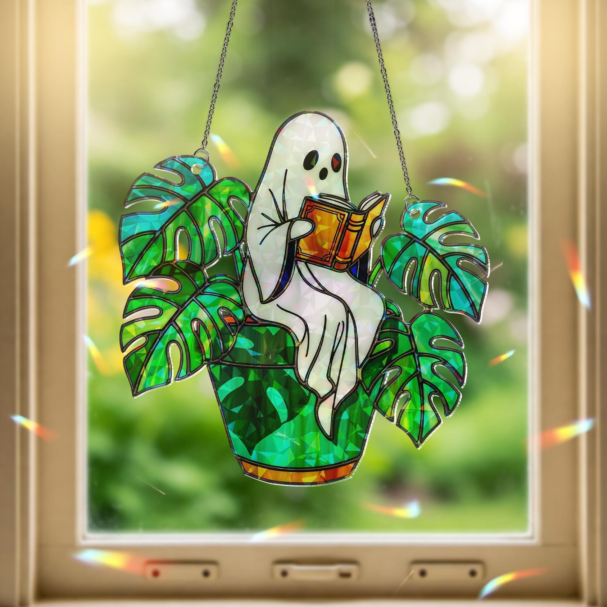 Ghost Plant Suncatcher – Holographic Acrylic Window Decor, Reading Ghost in Monstera Pot, Spooky Cottagecore Gift for Plant Lovers