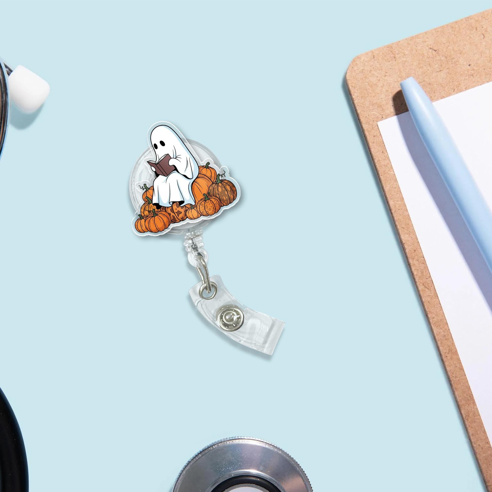 Ghost Reading Badge Reel | Halloween ID Badge Holder | Cute Fall Book Lover Gift | Pumpkin Retractable Name Tag Clip for Nurses & Teachers