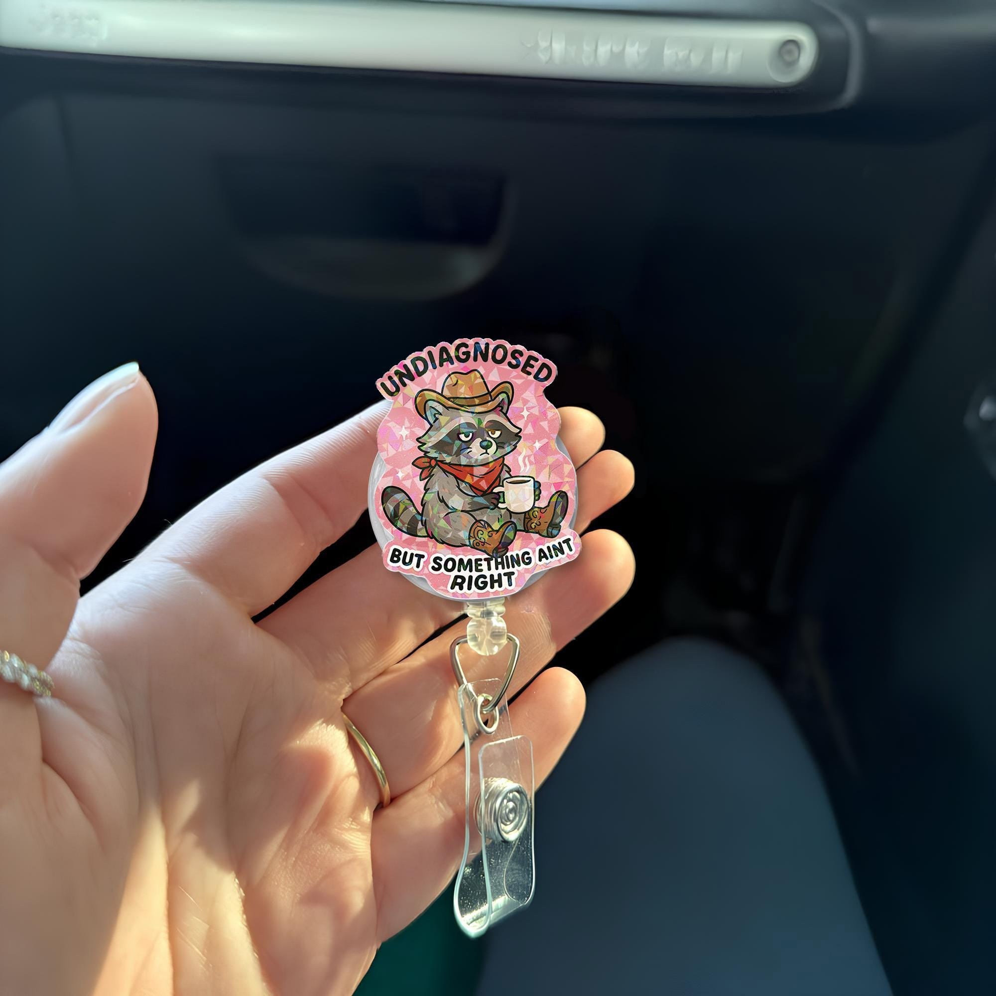 Funny Holographic Badge Reel – “Undiagnosed but Something Ain’t Right” Raccoon ID Holder–Mental Health Humor for Nurses, Teachers, or Office
