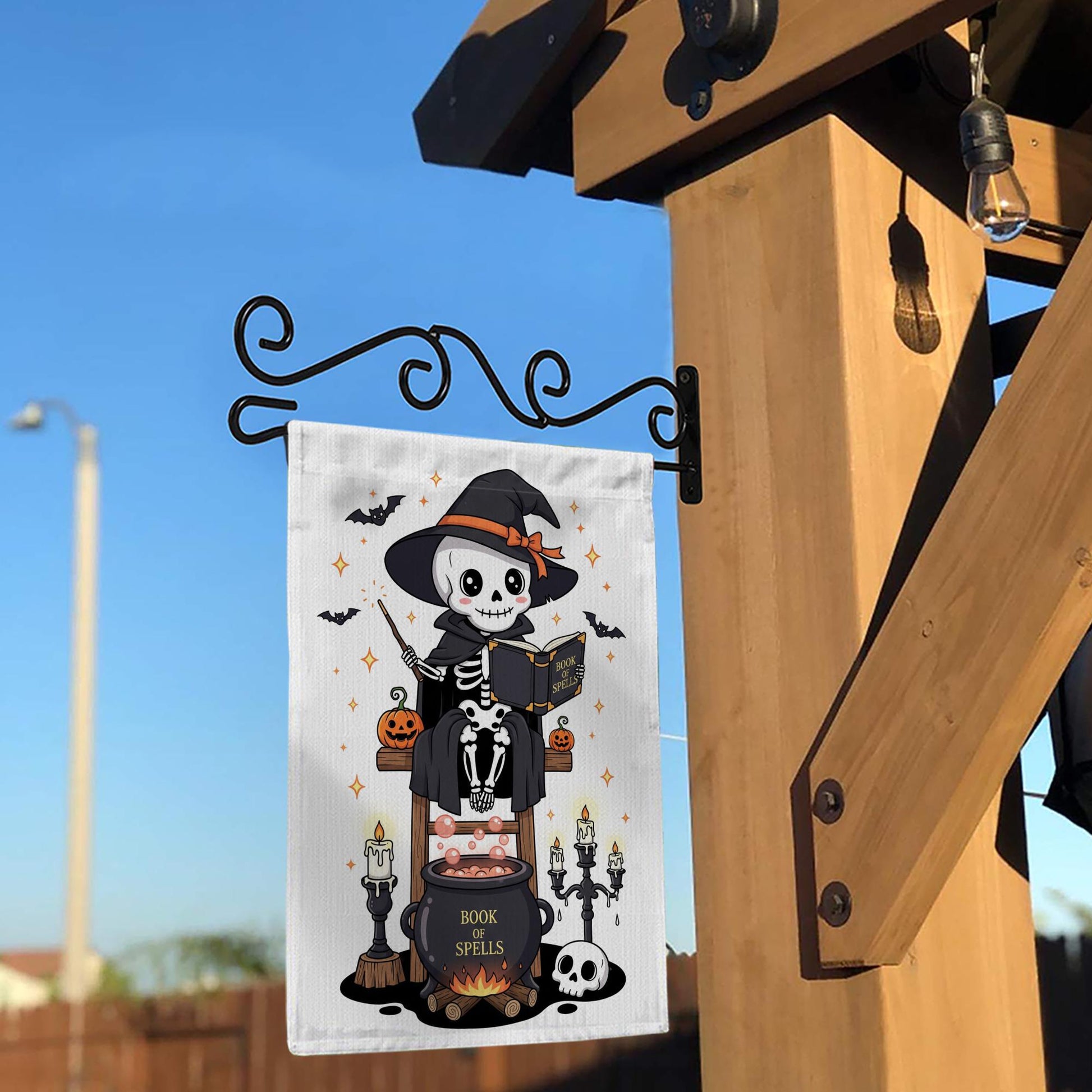Cute Skeleton Witch with Book of Spells Halloween Garden Flag – Skeleton Cauldron Spooky Decor