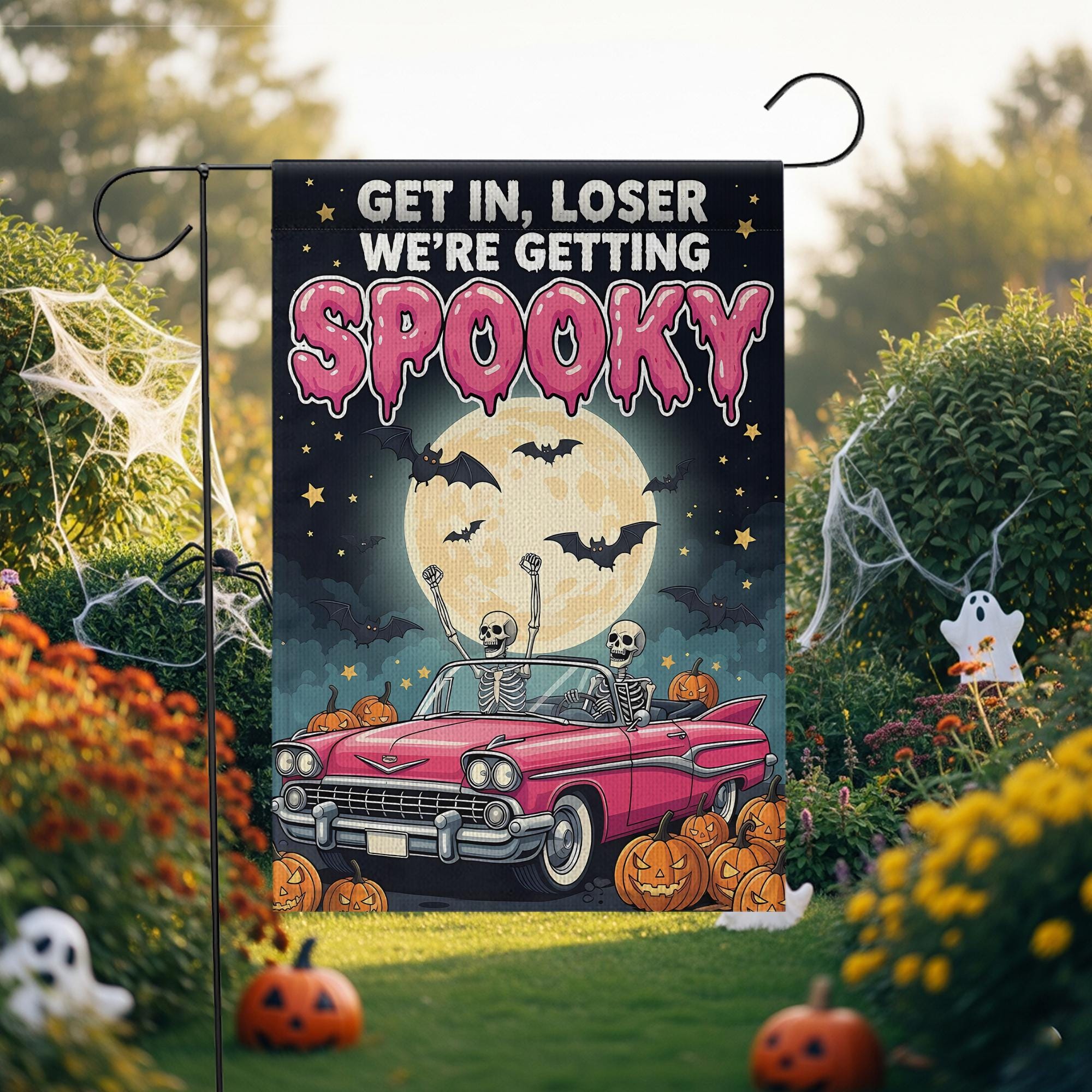 Funny Halloween Garden Flag: Spooky Skeletons in Pink Car