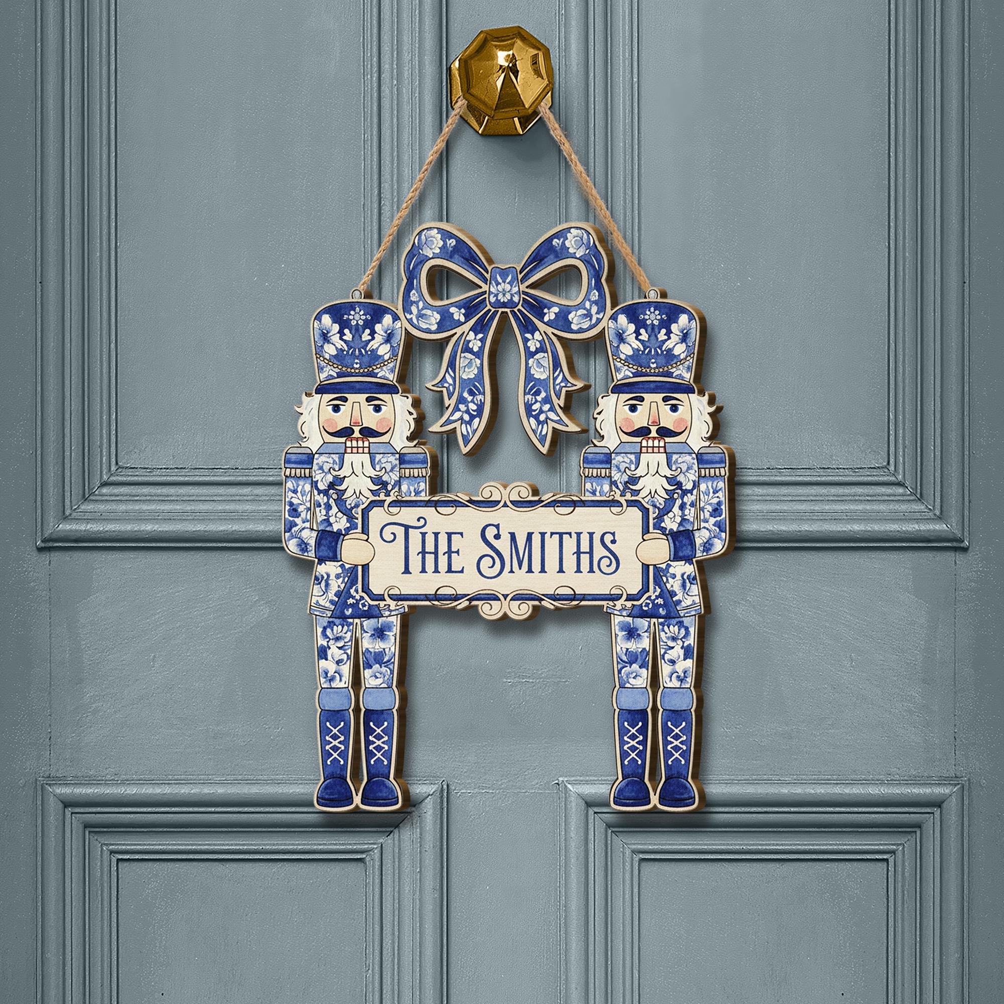 Nutcracker Wooden Sign – Personalized Blue and White Family Christmas Door Hanger