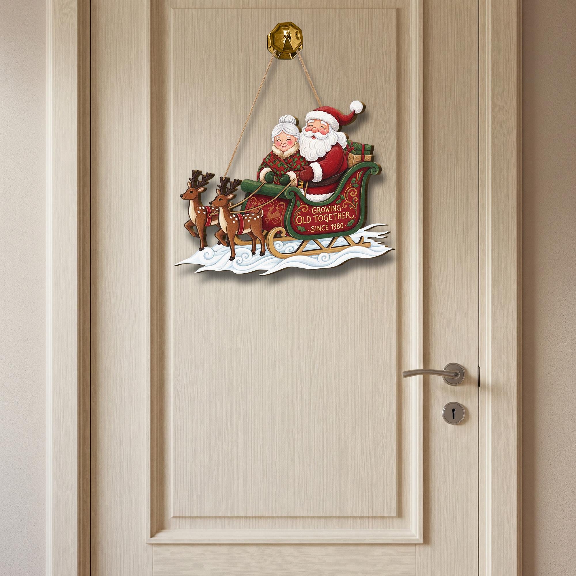 Wooden Door Hanger – Santa and Mrs Claus Sleigh with Reindeer Design