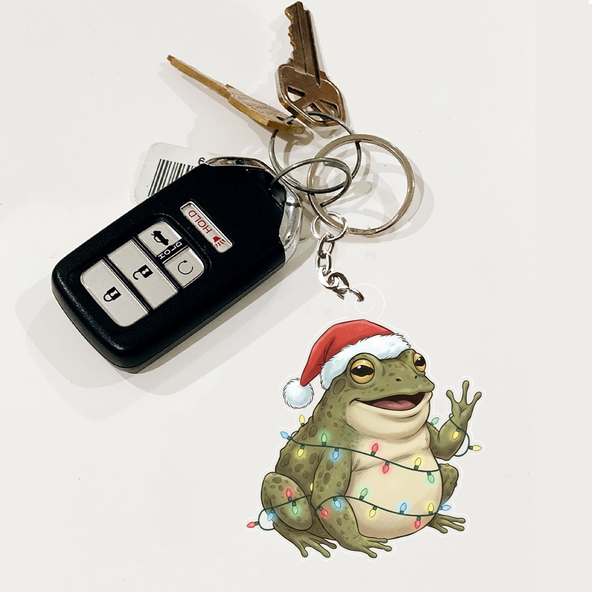 Acrylic Frog Keychain – Christmas Toad with Santa Hat and Holiday Lights