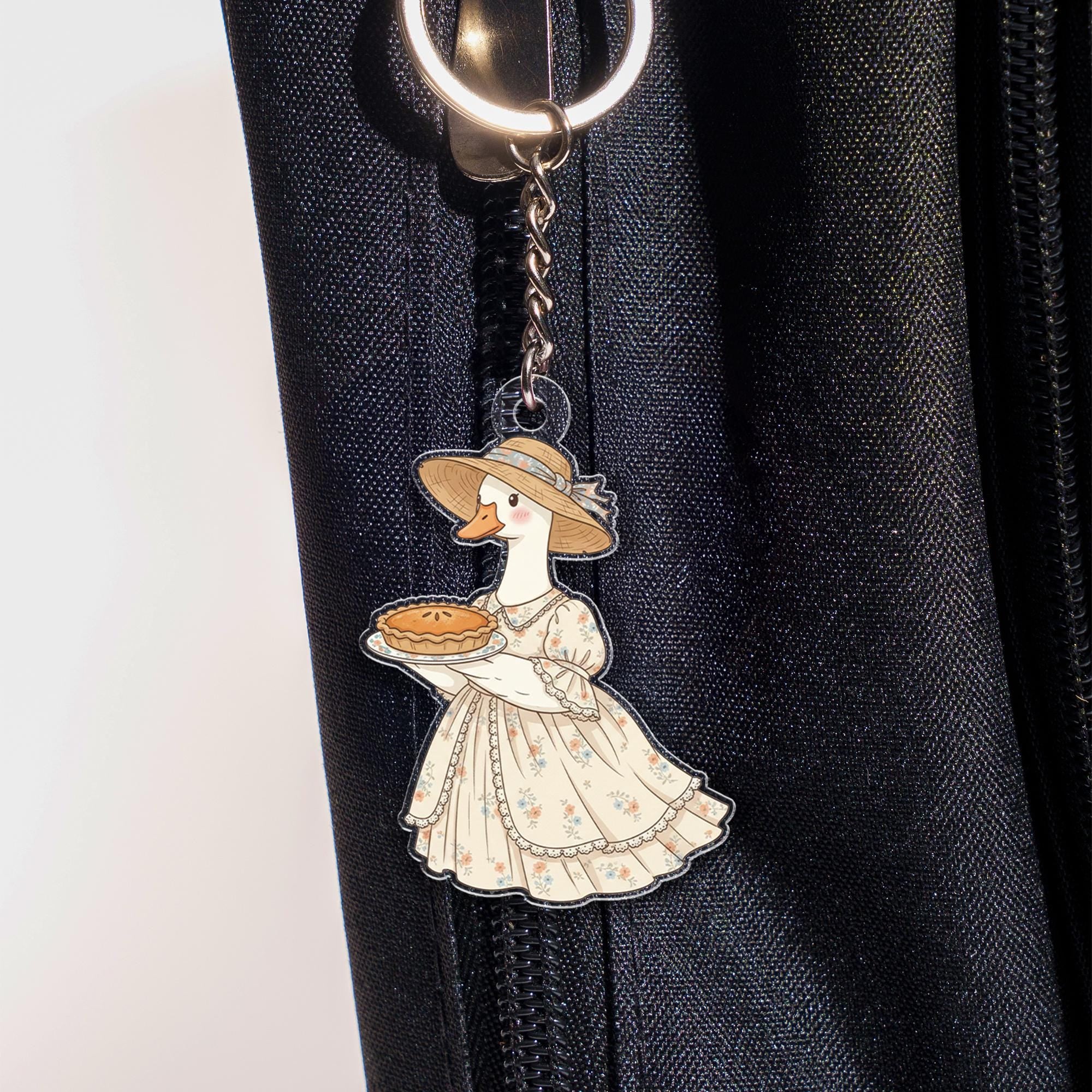 Acrylic Goose Keychain – Cartoon Animal in Dress Holding Pie