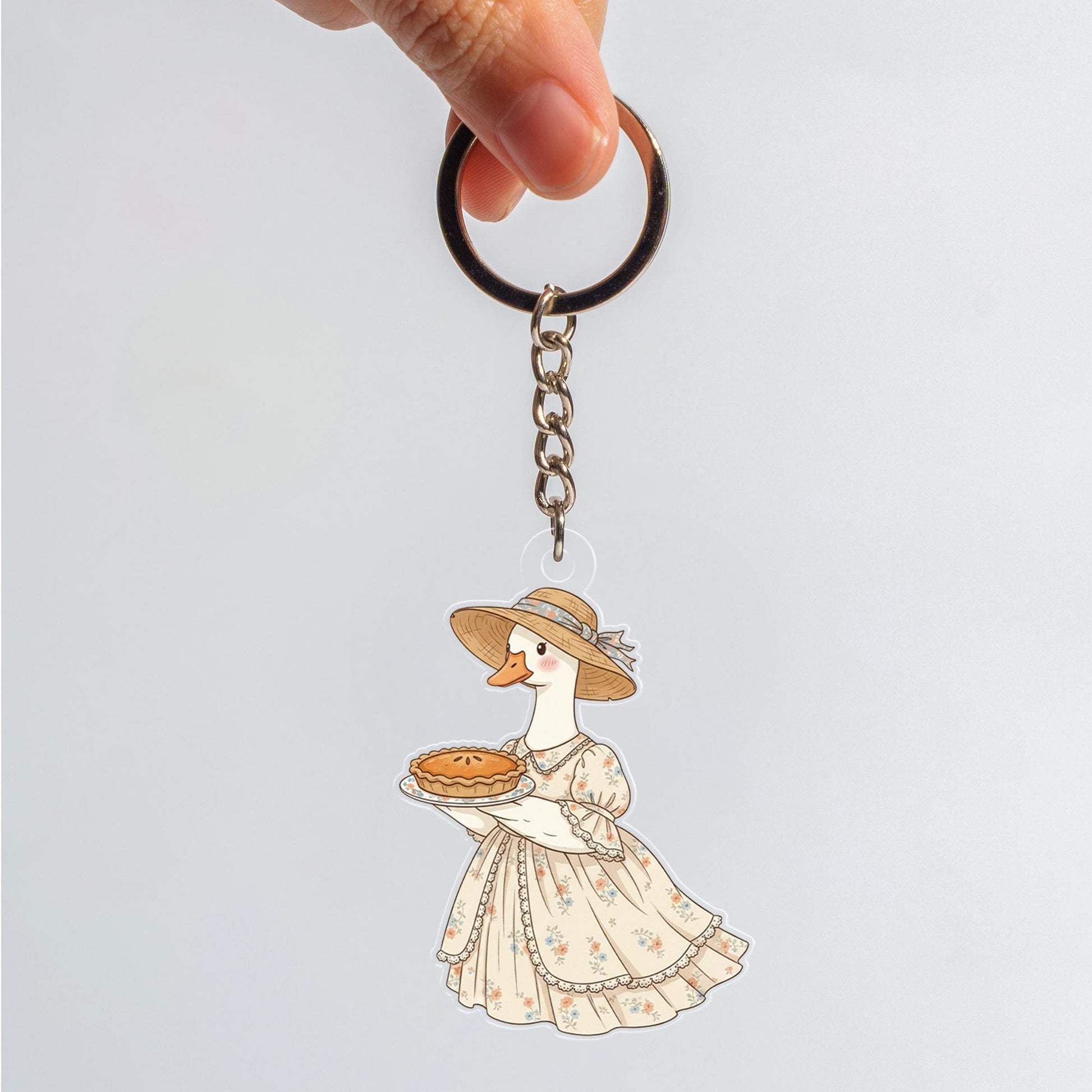 Acrylic Goose Keychain – Cartoon Animal in Dress Holding Pie