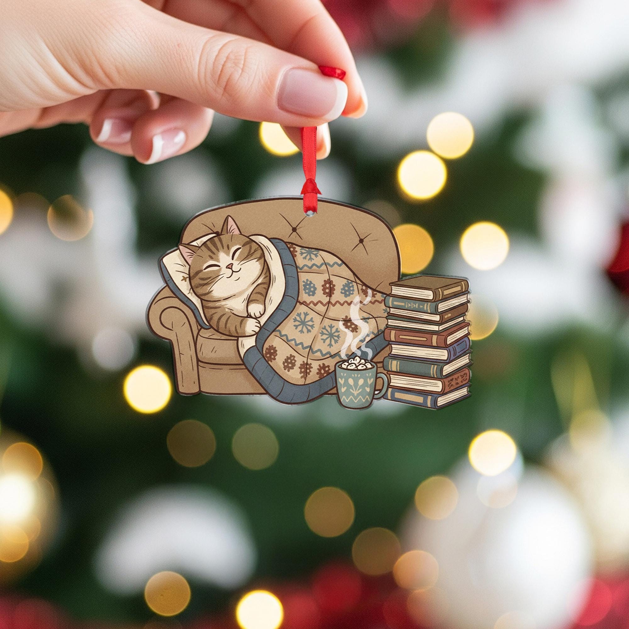 Cat Ornament on Sofa with Blanket and Books, Cozy Christmas Decoration with Hot Cocoa