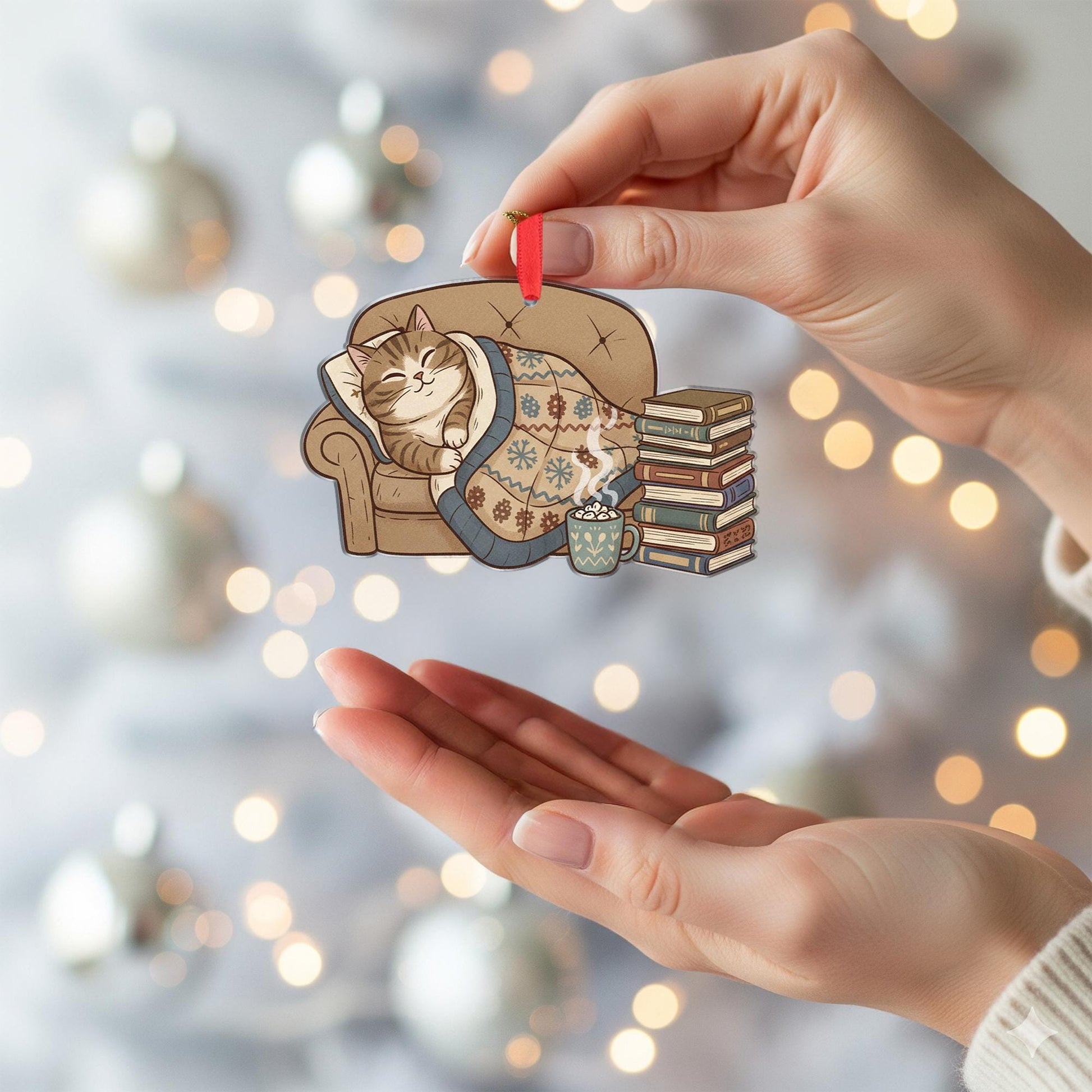 Cat Ornament on Sofa with Blanket and Books, Cozy Christmas Decoration with Hot Cocoa