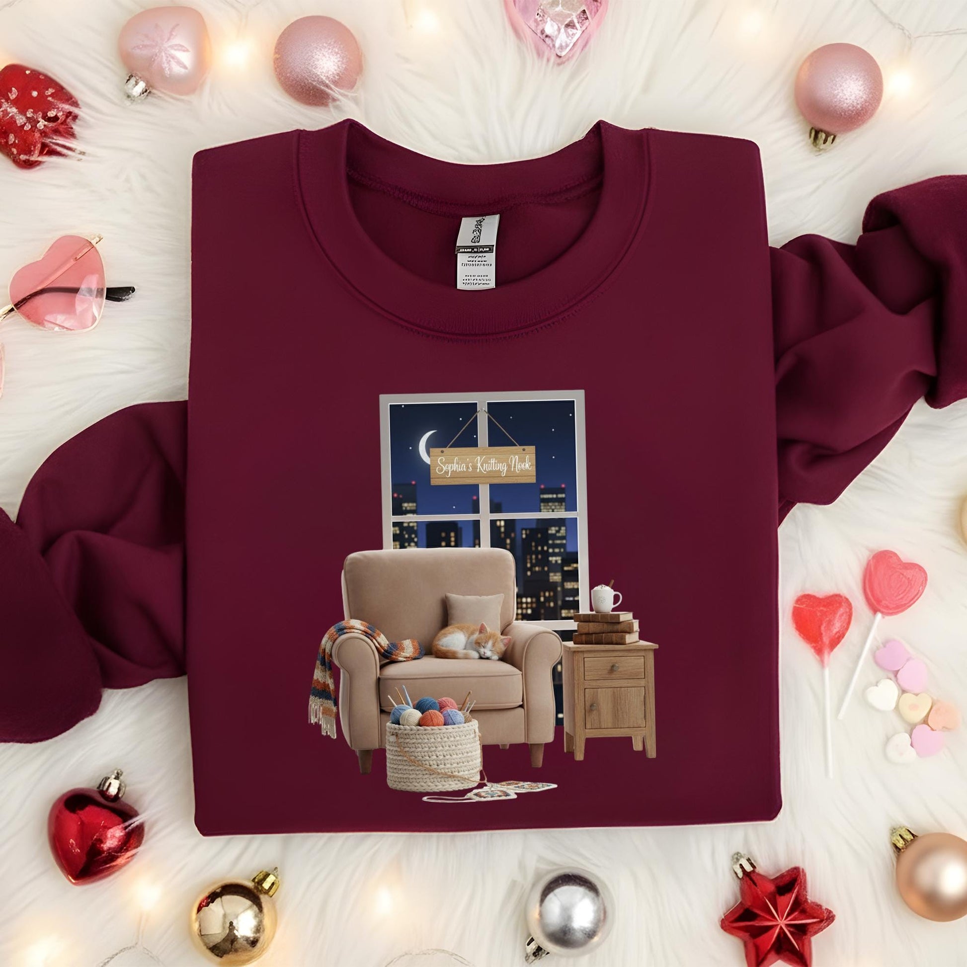 Personalized Sweatshirt: Knitter's Nook Graphic with Custom Name Sign, Black Crewneck, Sleeping Cat image 1